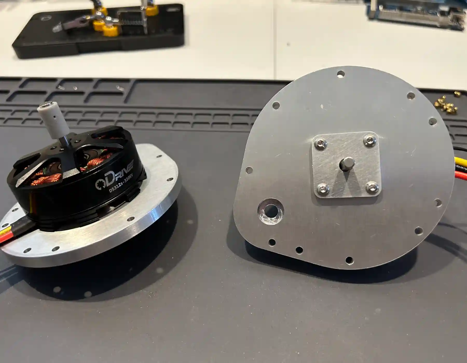 Partially assembled motor plates